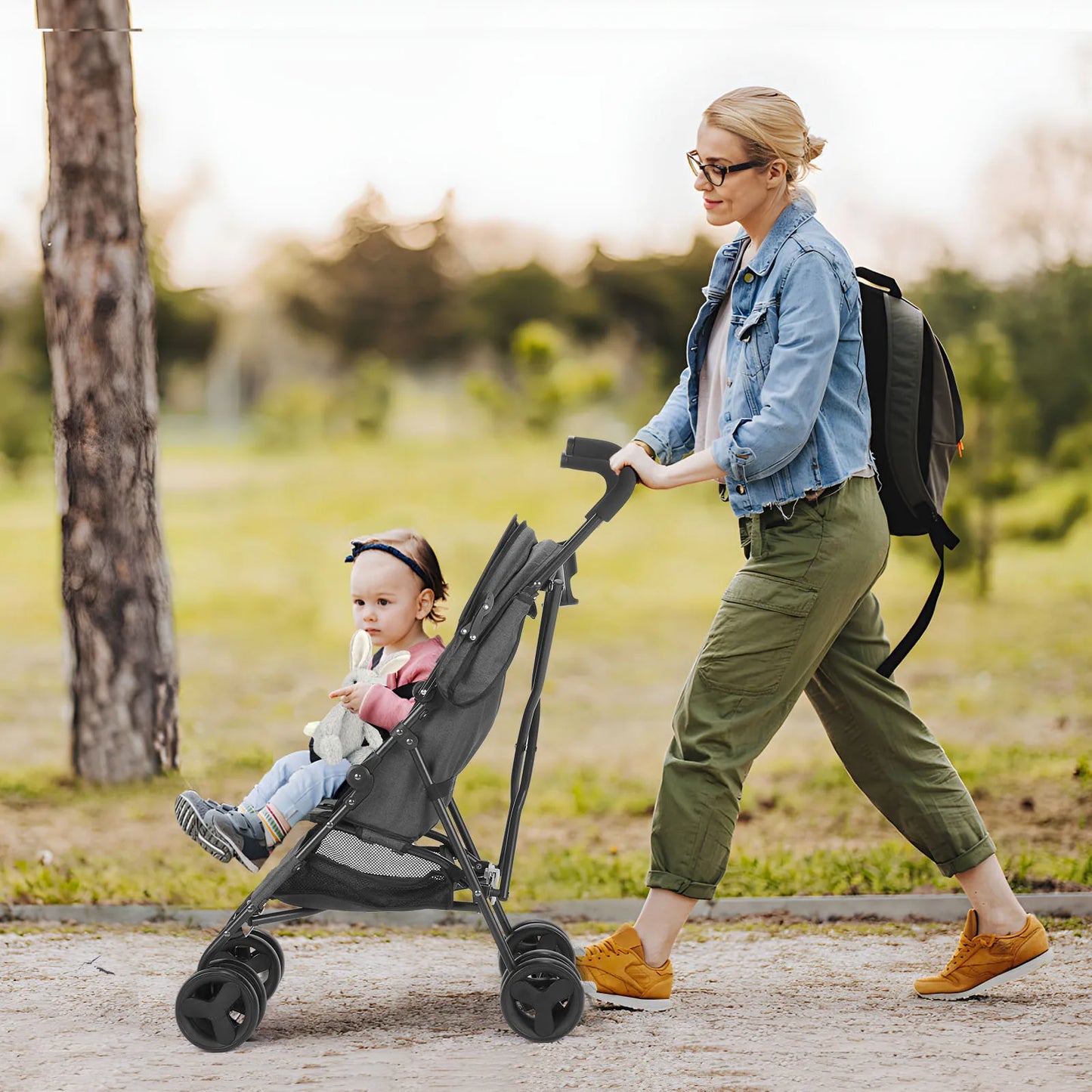 Lightweight Folding Stroller With Reclining Seat And Four Wheels